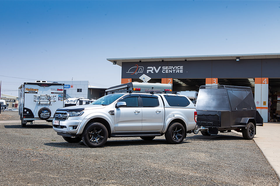 Caravan being serviced by RV Service Centre staff